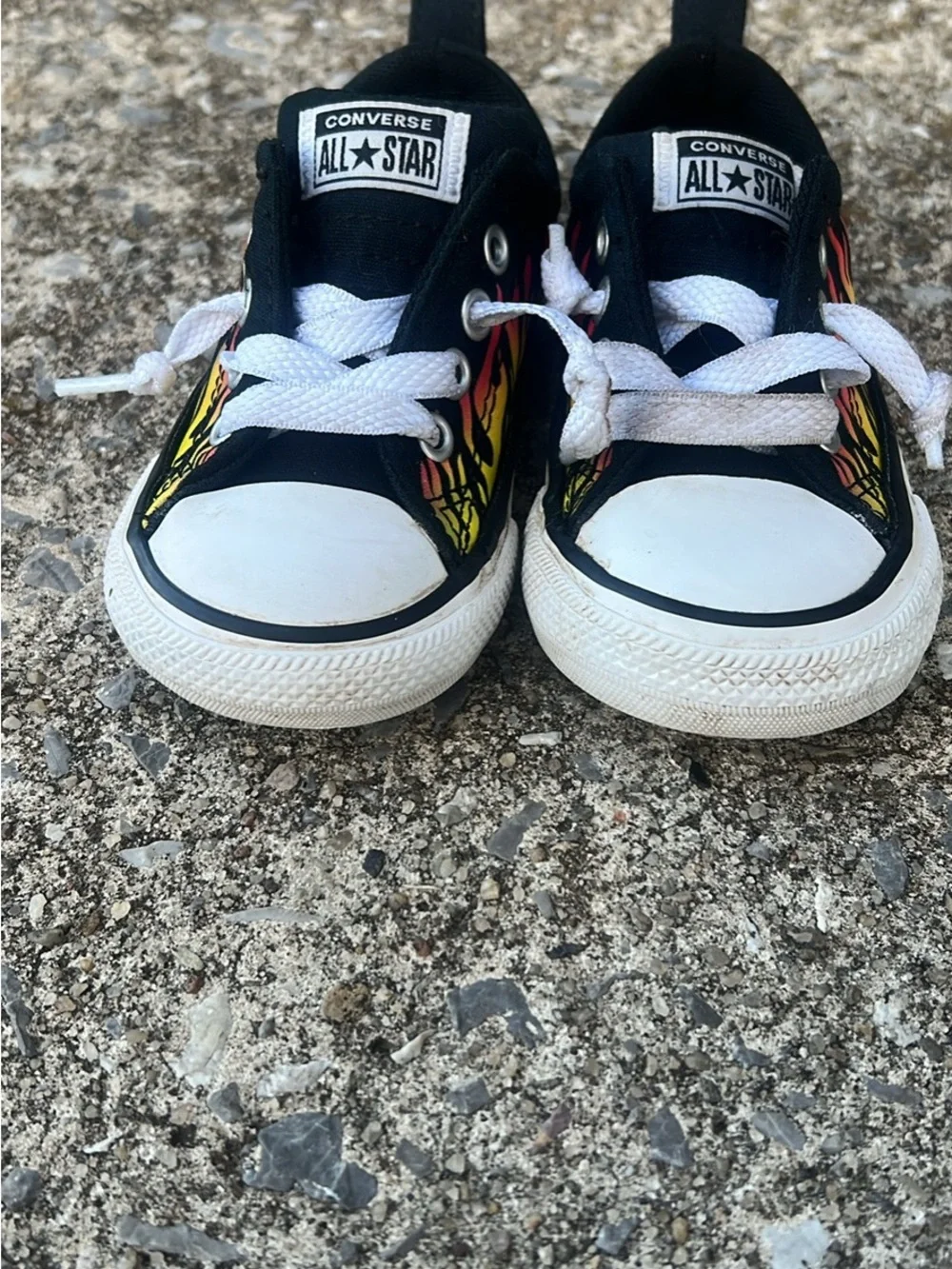 Converse Kids Low-Top Sneakers in Black with Red and Yellow Flame Print
